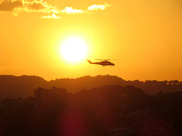 Mi-35M2 Caribe  helicopter flying low over Caracas in backlight the Julio 5 of 2021 in the framework of the independence parade of Venezuela