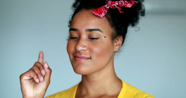 istock Young black woman finding solution, mixed race girl enlightenment eureka moment 1396303159