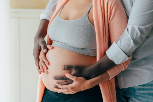 istock Couple expecting their first baby 1396308620