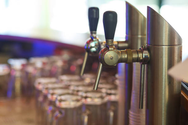 istock Close up of beer lines for draft beer in restaurant. 1396313600
