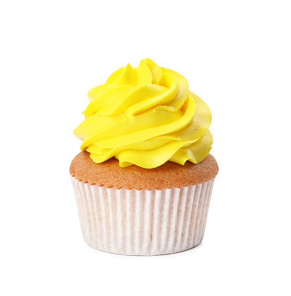 Delicious cupcake with yellow cream isolated on white