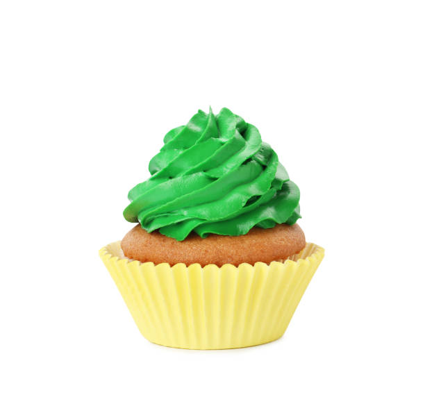 istock Delicious cupcake with green cream isolated on white 1396316026