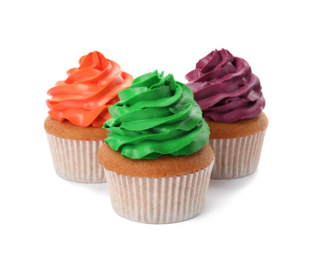istock Different delicious colorful cupcakes on white background 1396316542