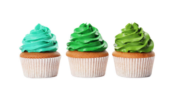 istock Different delicious colorful cupcakes on white background 1396316568