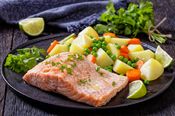 istock Multi Cooker salmon, carrots, peas and potatoes 1396319972