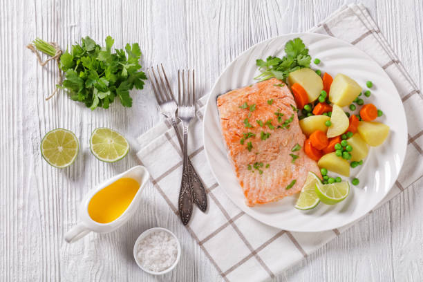 istock Multi Cooker salmon, carrots, peas and potatoes 1396319991