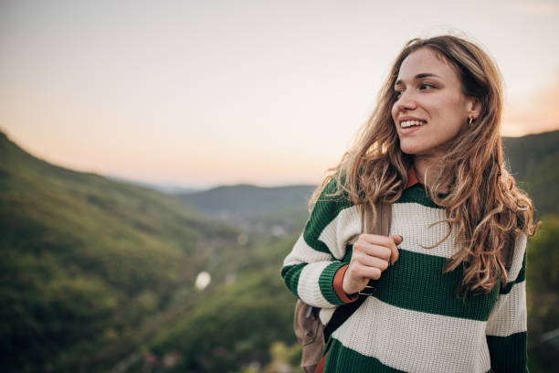 istock Beautiful woman in nature 1396325022