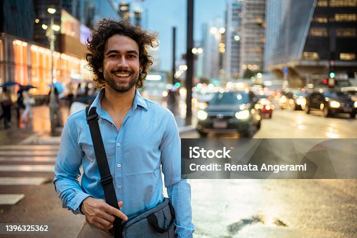 istock Portrait of young man at Avenida Paulista, São Paulo, Brazil 1396325362