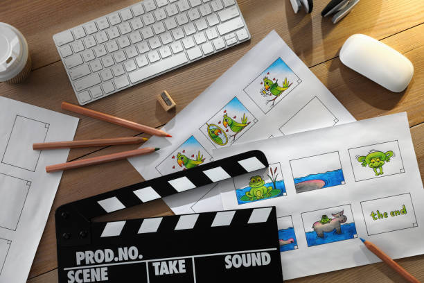 Storyboards with cartoon sketches at workplace, flat lay. Pre-production process