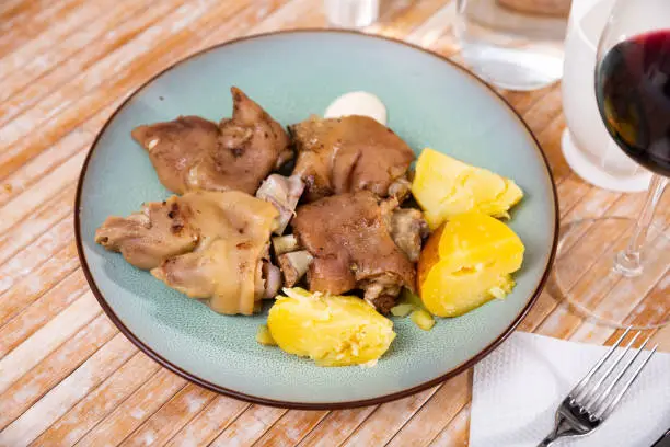 Photo of Stewed pig trotters with potato, homemade dinner