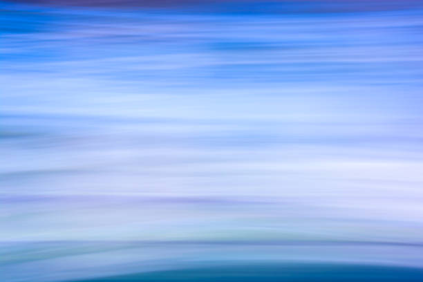 istock Abstract background in blue tones with horizontal waves, Business, travel, technology theme. Backdrop 1396327687