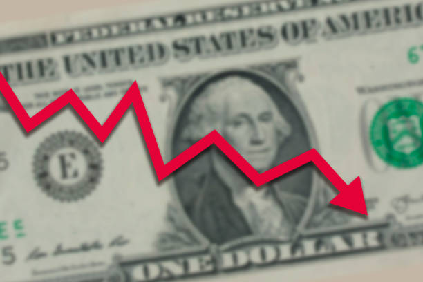 istock US dollar bill with red stock market chart arrow going down. 1396328614