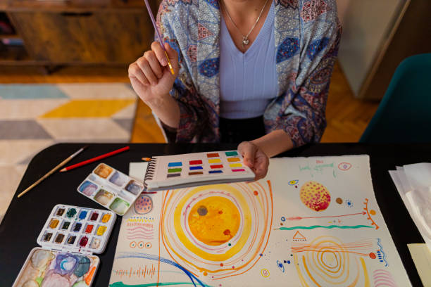 istock Artist choosing color from color palette 1396346691