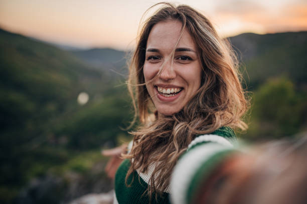istock Beautiful woman in nature 1396350153