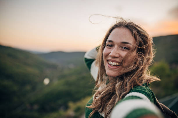 istock Beautiful woman in nature 1396350277