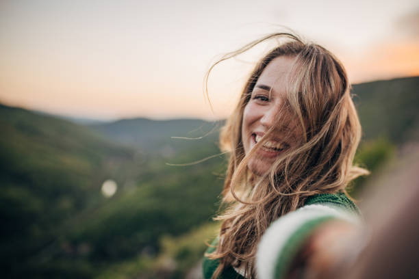 istock Beautiful woman in nature 1396350311