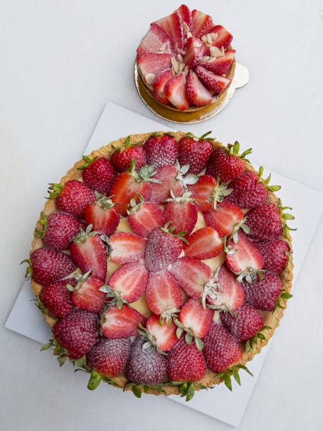 Home made delicious strawberry tart over white background