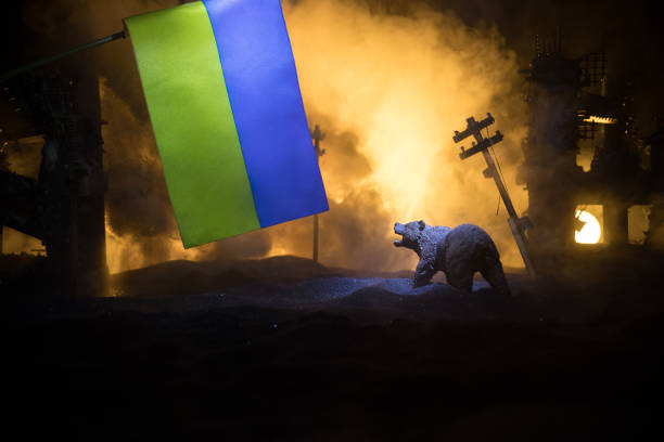 istock Creative artwork decoration war on Ukraine. Crowd looking on giant explosion and attacking soldiers. 1396354185