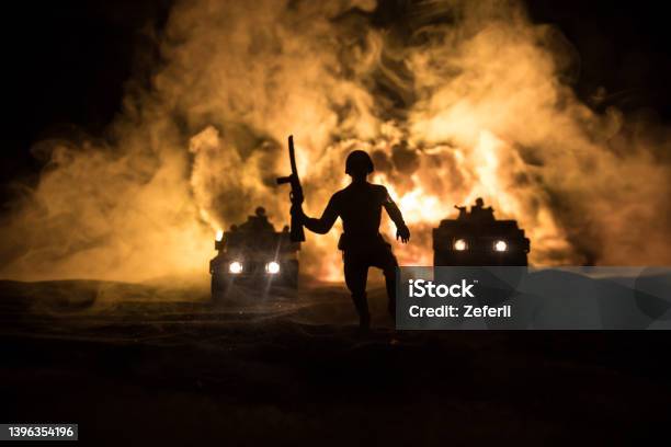 War Concept Battle Scene On War Fog Sky Background Fighting Silhouettes Below Cloudy Skyline At Night Army Vehicle With Soldiers Artwork Decoration Selective Focus Stock Photo - Download Image Now