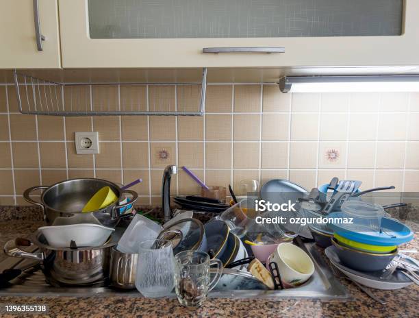 Close Up View Of Dirty Dishes In The Sink In The Kitchen Stock Photo - Download Image Now