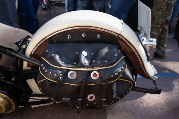 Classic custom saddlebags with rivets and buckles for a beautiful Harley Davidson