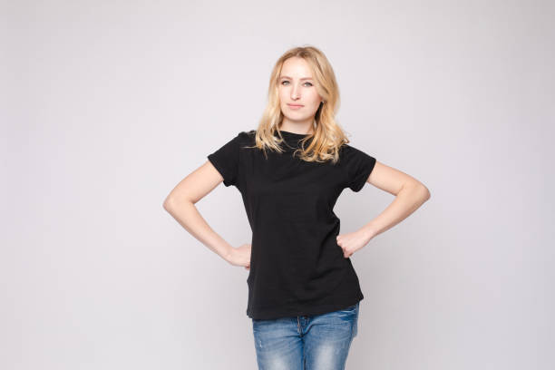 istock Angry or sad girl with folded arms. 1396361552