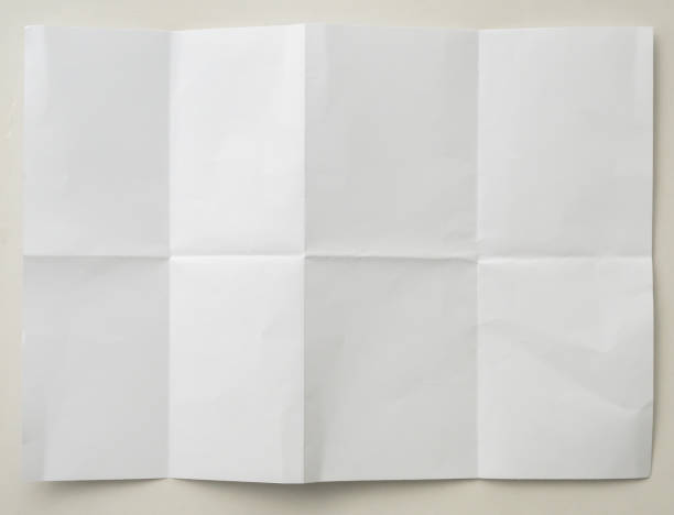 istock White folded and wrinkled paper on white background 1396362210