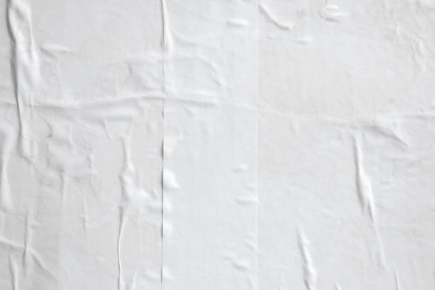 istock white crumpled and creased paper poster texture background 1396362466