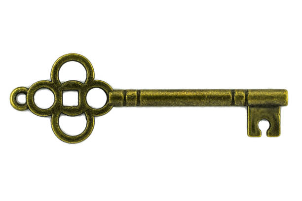 istock vintage key antique golden key on white background Clipping path 1396362765