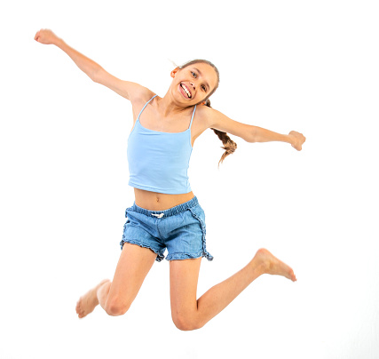 Happy teen girl jumping