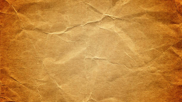 istock Blank brown paper background isolated on white 1396381006