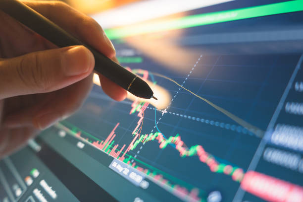 istock Business man stock exchange trader broker looking at pc computer screen, investor manager analyzing financial chart trading online investment data price crypto currency market graph, managing risks. TradingView 1396383868