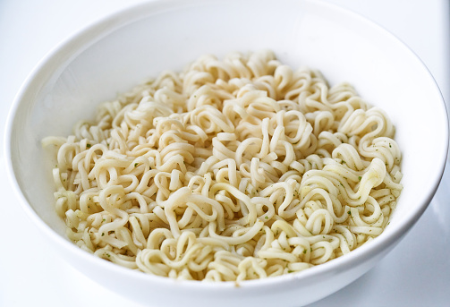 noodles in bowl isolated on white background. This has clipping path.