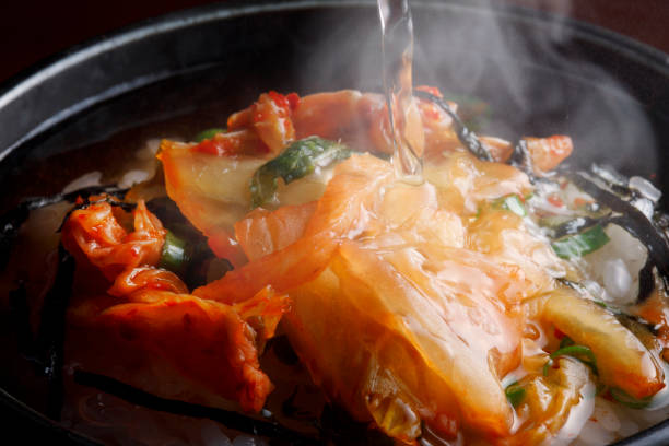 Serve side dishes over rice and pour dashi, Japanese tea, or hot water.
