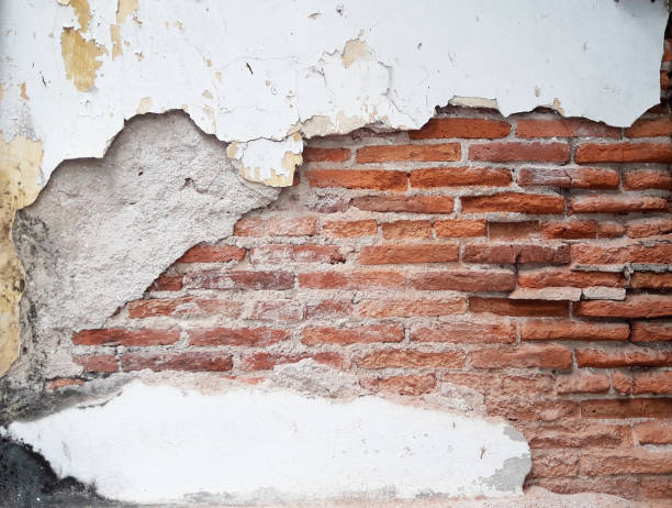 istock Background and Texture from Vintage red brick wall is deteriorating 1396386740