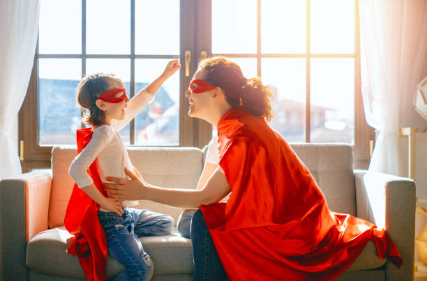 istock Family in Superhero costumes 1396388875