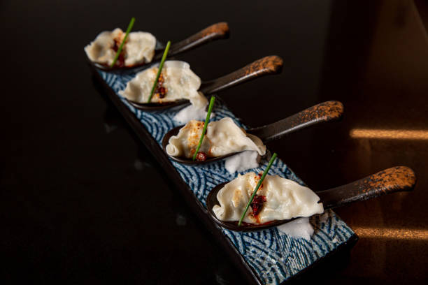 istock Chilli sauce dumpling with spoon serves in the fine dining Japanese restaurant 1396390949