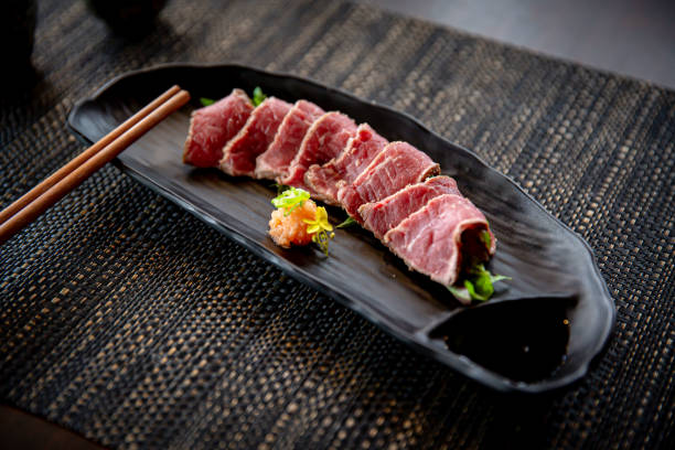 Beef tataki appetizer in the traditional Japanese ramen restaurant