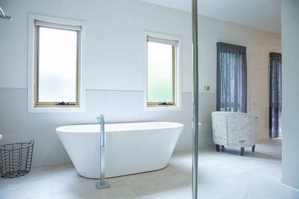 istock Bright white modern interior bedroom with opening bathroom in accommodation 1396391344
