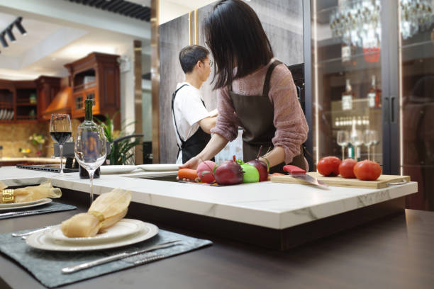 istock Couples in the kitchen are washing dishes and preparing dinner 1396396634