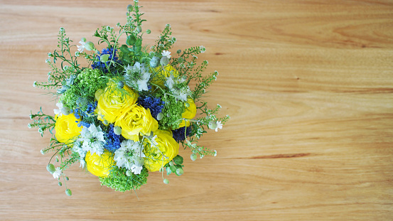 Bouquet placed on a wooden table