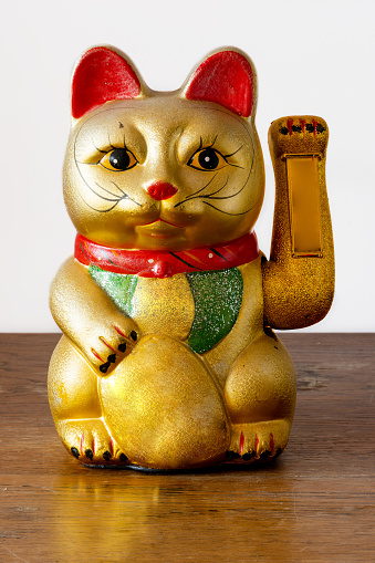The Maneki Neki luck cat icon of Japan, asian culture
