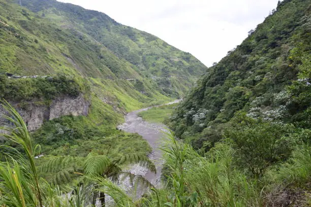 River near by Cascada Manto de la Novia, waterfall in Banos de Agua Santa, Banos, Ecuador