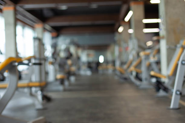 istock Blurred interior of modern gym 1396397868