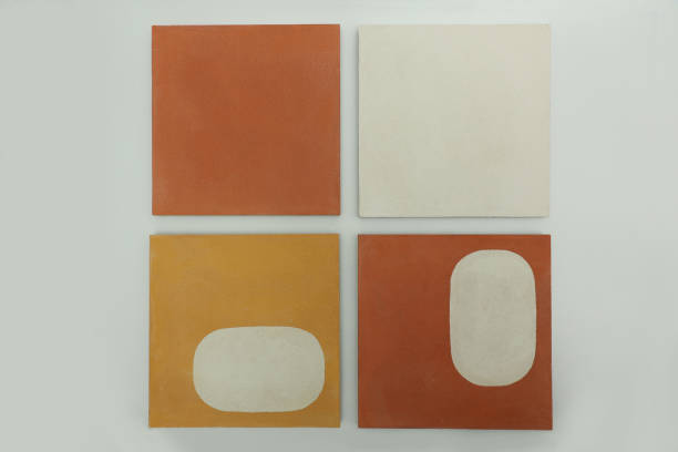 Tile flooring with a minimalistic pattern in the form of a white spot on tile