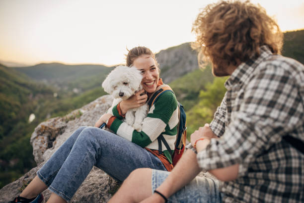 istock Couple relaxing on mountain 1396401635