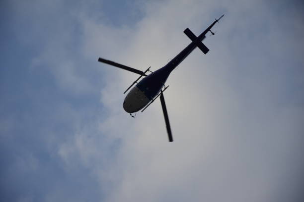 istock Helicopter flying against the blue sky. Guayaquil 1396402332