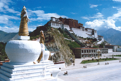 The famous Potala Palace.The residence and office space of the successive Dalai Lamas.In September 1995, There is a new square under the Potala Palace.Film photo in 1995's Lhasa,Tibet