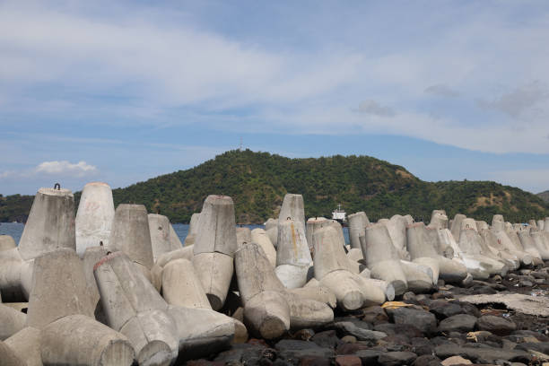 istock concrete tetrapods or dolos, wave barriers in the sea 1396406265