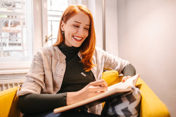 istock The personal assistant recording the meeting in the diary 1396411258